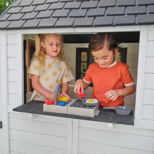 KidKraft Riverscape Wooden Playhouse with Working Doorbell, Fence, Kitchen and Pet Door - Unique Gift Market