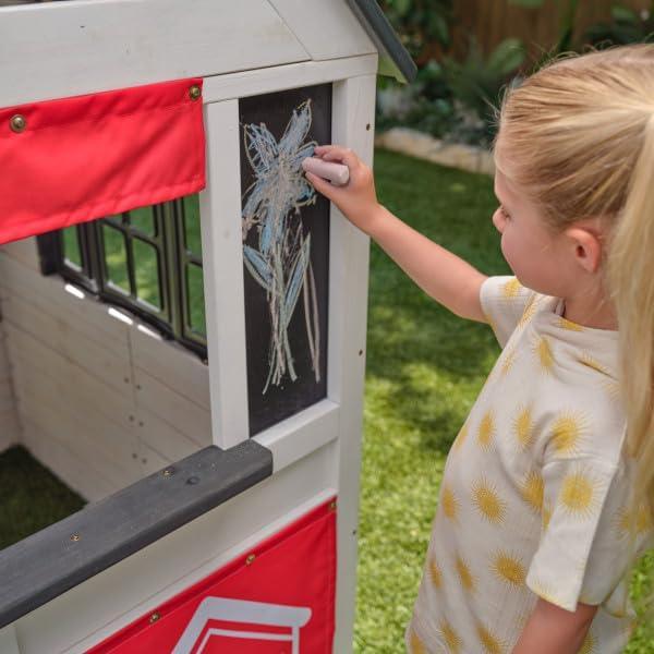 KidKraft Riverscape Wooden Playhouse with Working Doorbell, Fence, Kitchen and Pet Door - Unique Gift Market